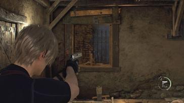 Leon aiming his pistol through a window in Resident Evil 4 remake.